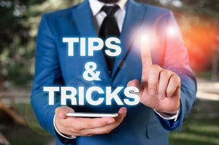 Businessman pointing at tips and tricks