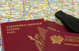 Passports Lying On A Map And Car Key