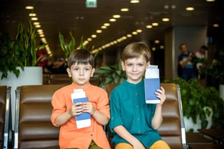 Young Travelers Waiting at Airport