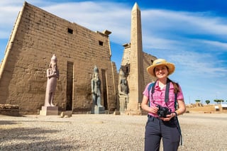 Woman Tourist At Luxor Temple In A Sunny Day Luxor Egypt