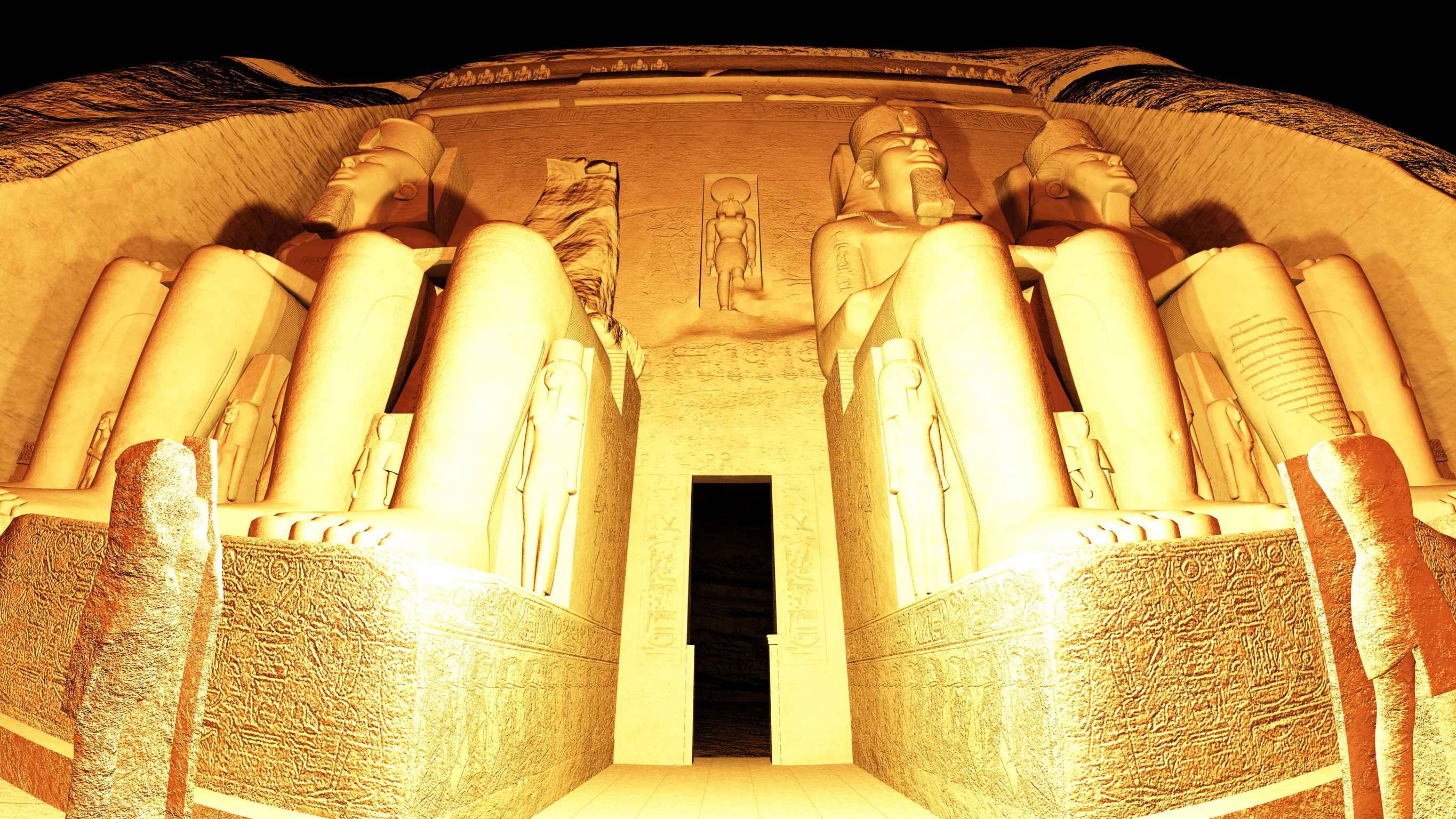 Die Statuen des Tempels von Abu Simbel sind nachts beleuchtet.
