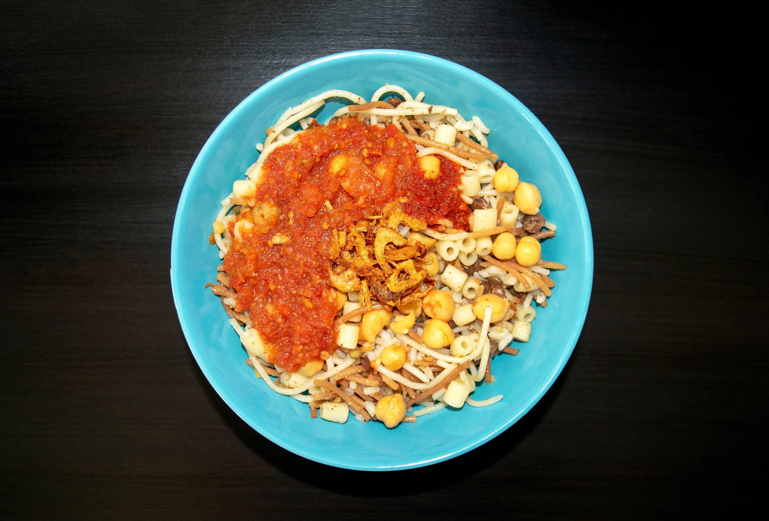 Egyptian Dish Koshari With Tomato Sauce
