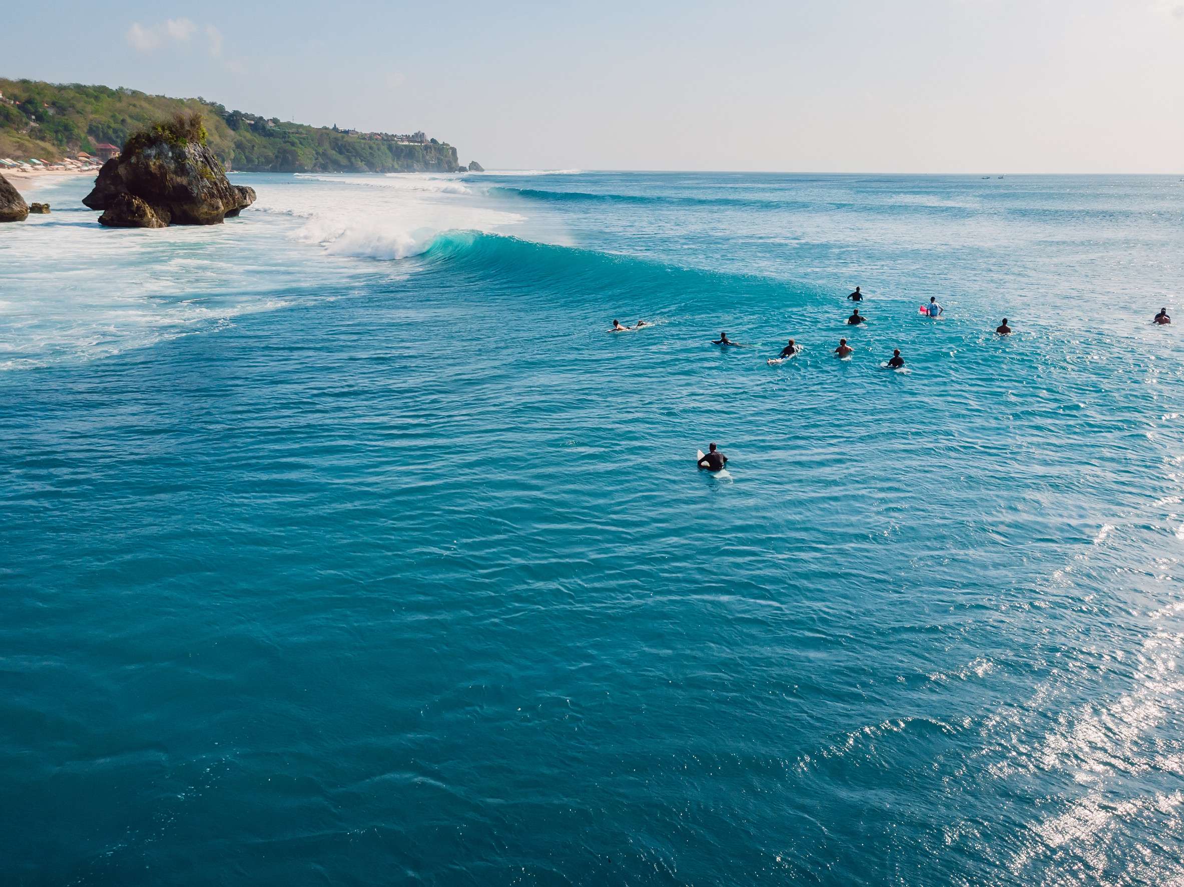 Surfers At Blue Ocean In Bali